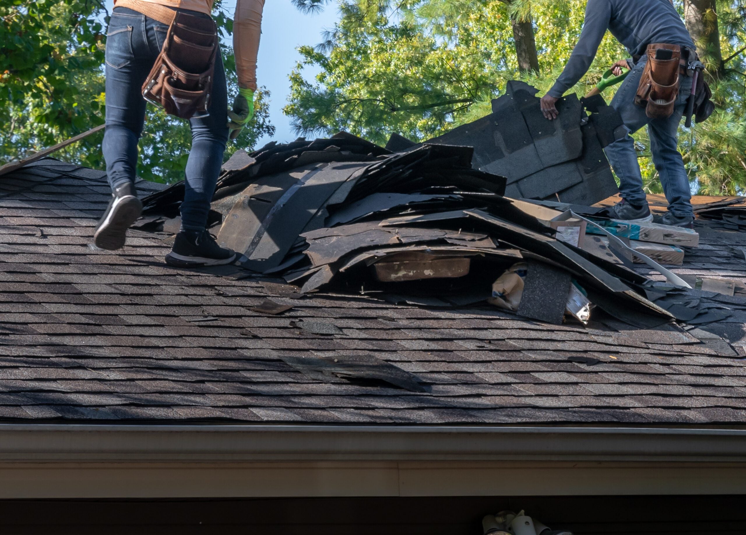 hail damage roof repair project in progress